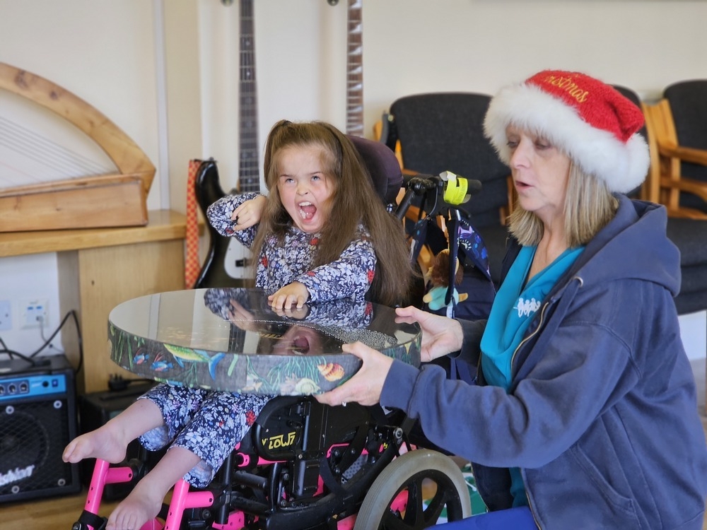 Girl in music therapy session